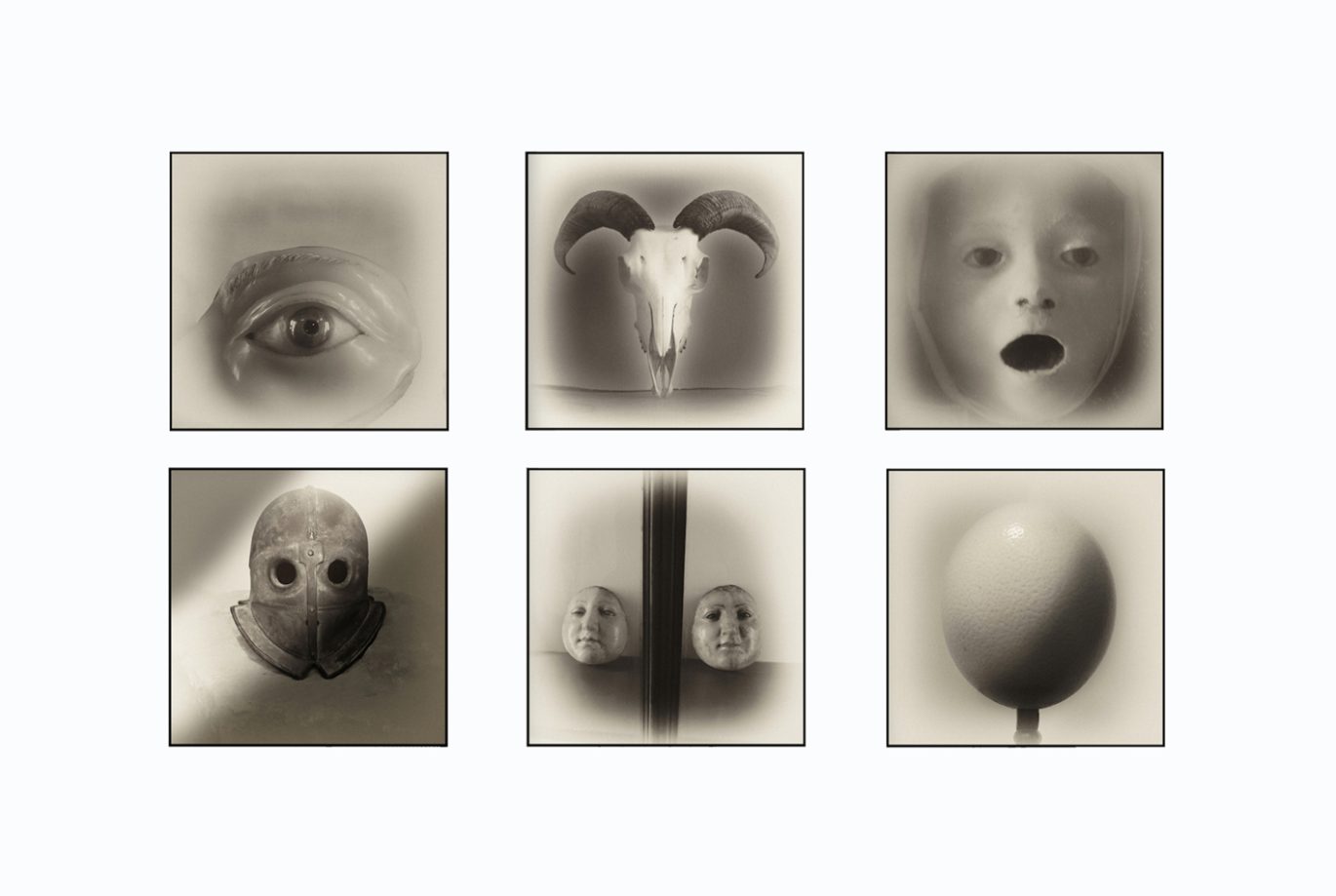 Six surreal monochrome photographs from Armageddon by Augusto De Luca, featuring faces, symbolic objects and dreamlike imagery.