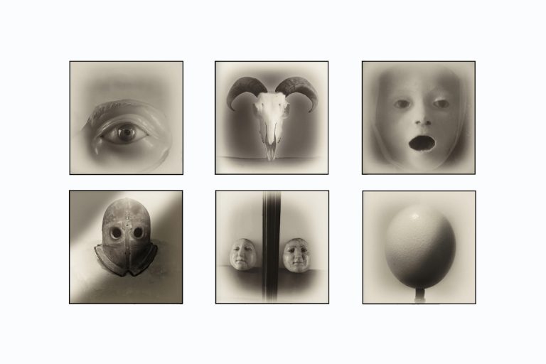 Six surreal monochrome photographs from Armageddon by Augusto De Luca, featuring faces, symbolic objects and dreamlike imagery.