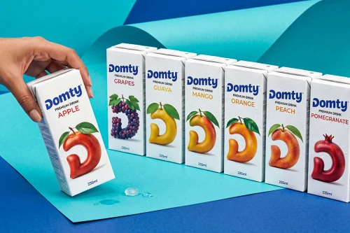DOMTY juice packaging design by Ramy Mohamed featuring a colourful range of fruit juice cartons
